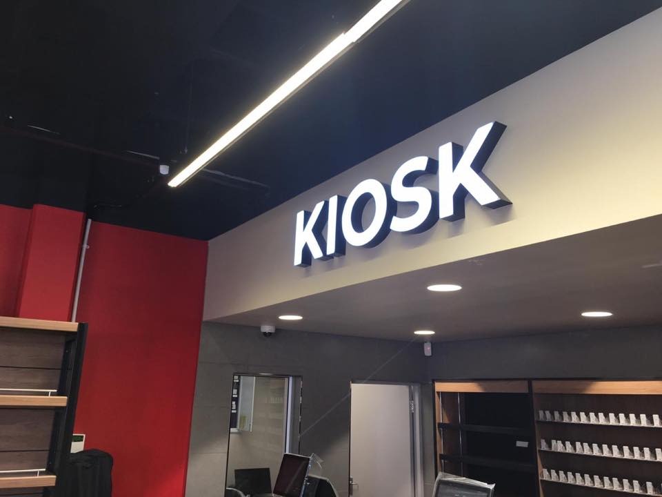 OK Foods illuminated shop front sign installed by FOSKO